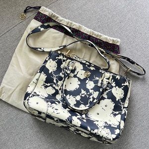 Tory Burch floral prints on leather crossbody/handbag